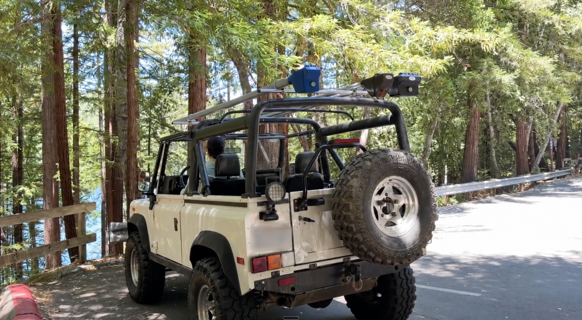 Double rod carrier mounted on a vintage 4x4 in the redwoods